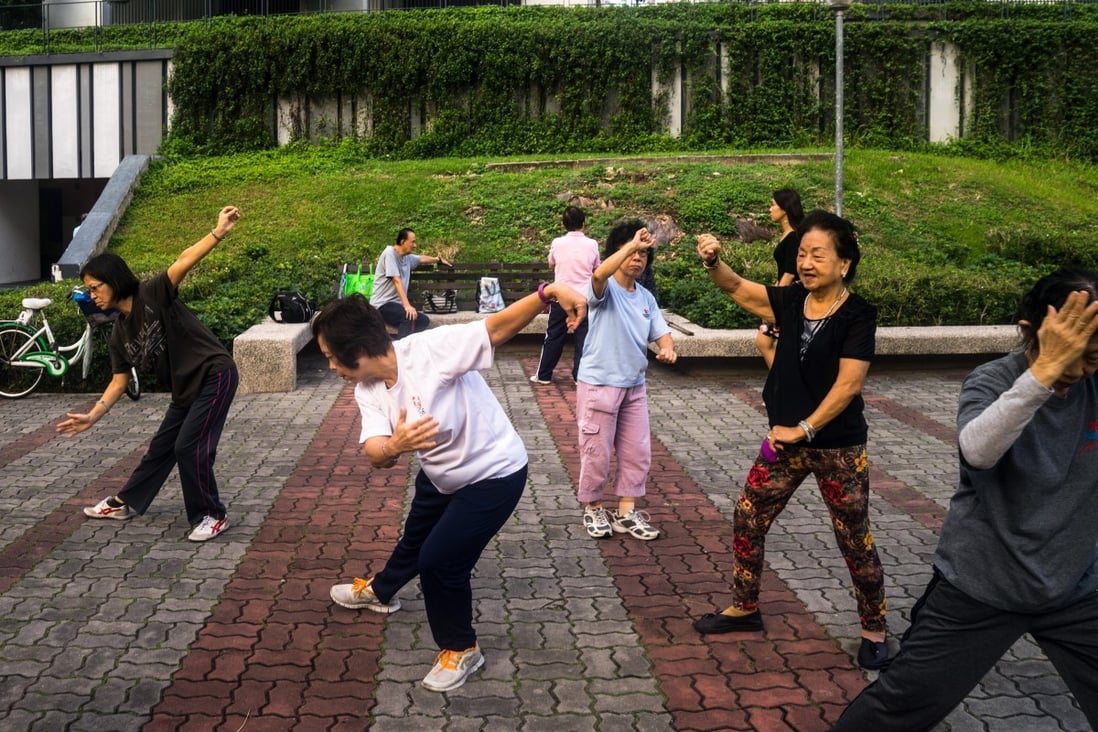 Singaporean residents practise tai chi at a Housing and Development Board (HDB) public housing estate in 2015. Photo: Bloomberg