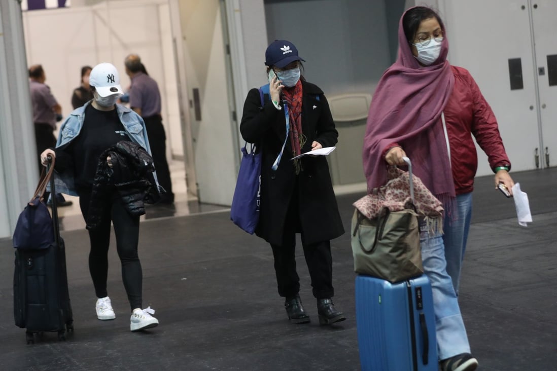 Air arrivals to Hong Kong leave Asia-World Expo after testing negative for Covid-19. Photo: Winson Wong