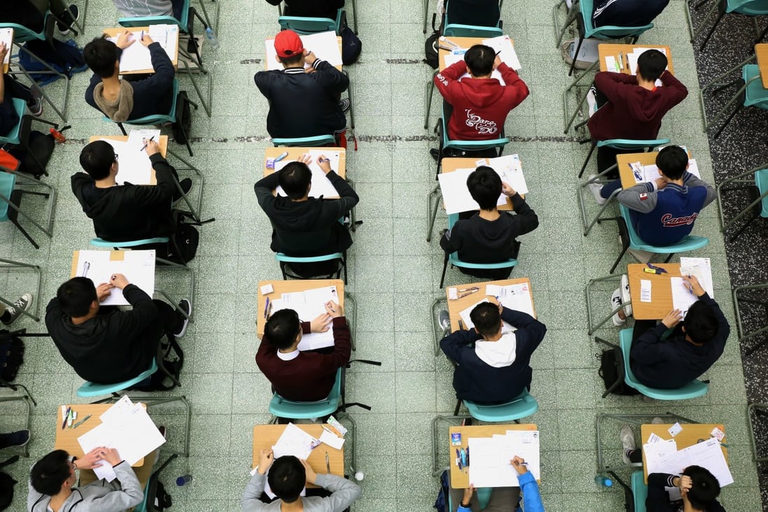 Hong Kong students on the first day of the Diploma of Secondary Education exams at the Cheung Sha Wan Catholic Secondary School last year. Exams in Hong Kong could be cancelled this year if there is a surge in coronavirus cases. Photo: SCMP