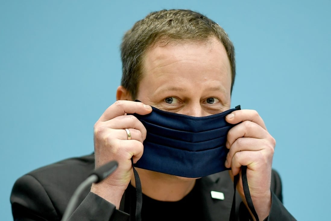 An article in Nature Medicine says the ACE2 expression in the nose could be higher than other parts of the respiratory system, making the nose a possible entry point for the coronavirus. Klaus Lederer, Senator for Culture and Europe of the State of Berlin, shows how to wear a mouth and nose protector. Photo: DPA