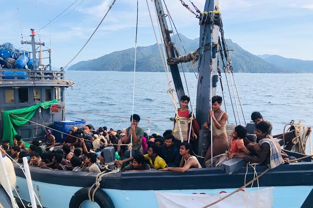 A wooden boat carries suspected Rohingya migrants detained in Malaysian territorial waters off the island of Langkawi. Photo: AP
