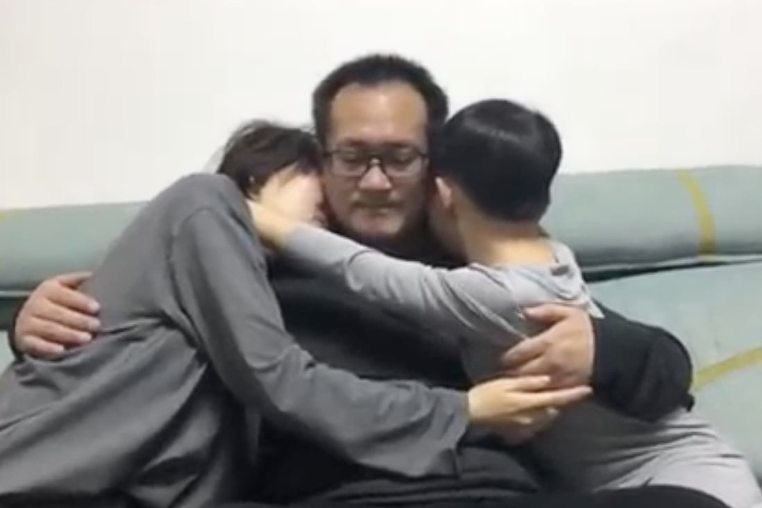 Released human rights lawyer Wang Quanzhang is reunited with wife Li Wenzu and their son on Monday. Photo: Handout