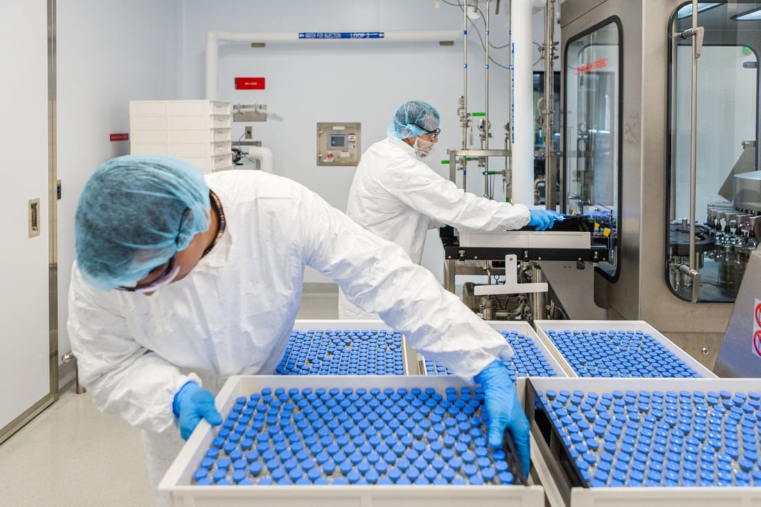 Lab technicians load filled vials of remdesivir at a Gilead Sciences facility in La Verne, California. Photo: Reuters