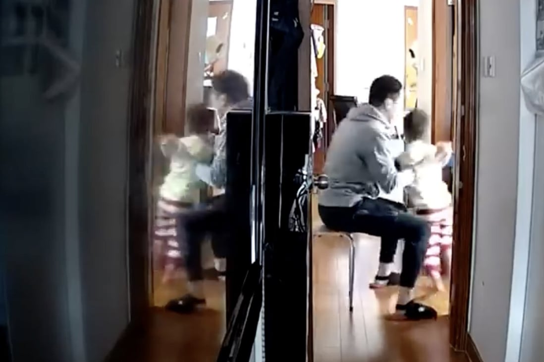 The viral video showing the man berating his young son. Photo: Facebook