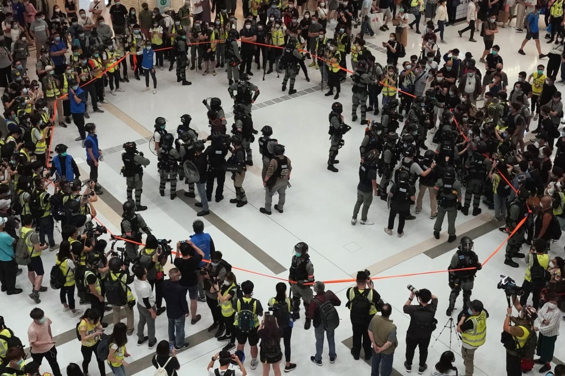 Riot police cordon off the atrium of New Town Plaza in Sha Tin, Hong Kong, on Labour Day. Photo: Felix Wong