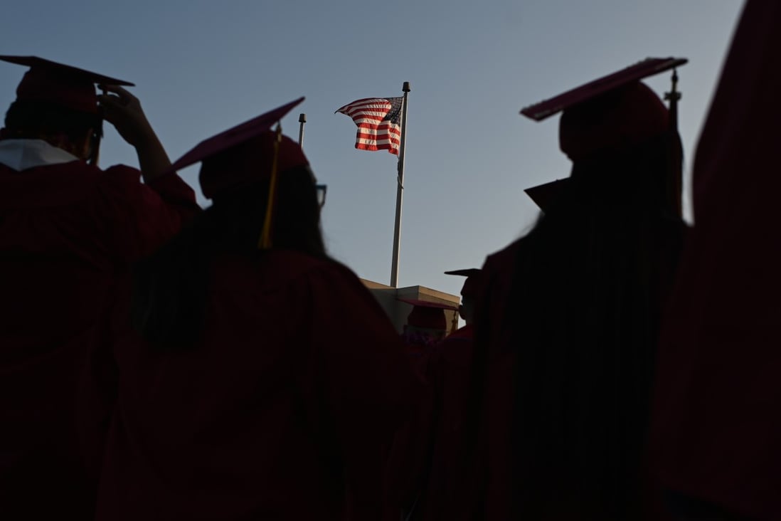 A US flag flies above a graduation ceremony at Pasadena City College last year. Photo: AFP