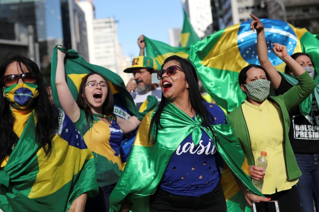 Supporters of far-right Brazilian President Jair Bolsonaro take part in a protest against social distancing and quarantine measures on Sunday. Photo: Reuters