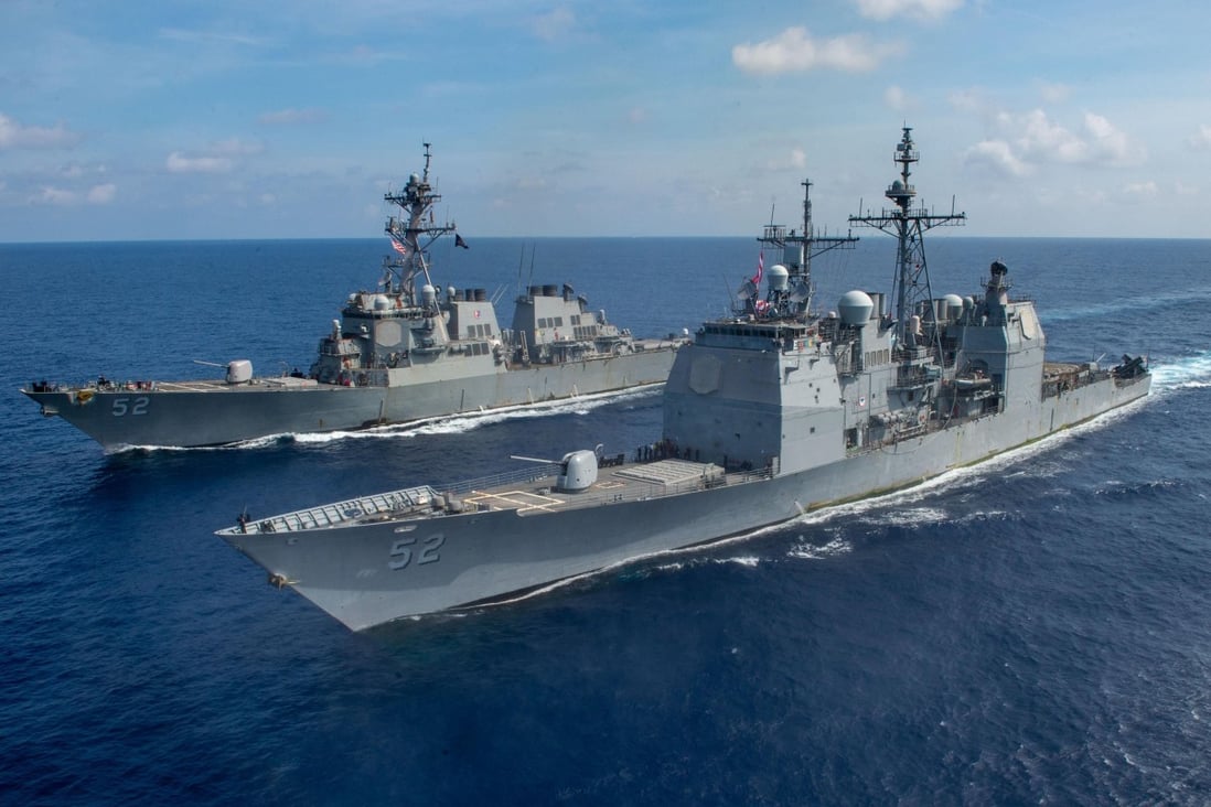 On April 18, the US Navy Ticonderoga-class guided missile cruiser USS Bunker Hill (front) and Arleigh-Burke class guided-missile destroyer USS Barry transit the South China Sea. The presence of both Chinese and American navy ships in the area in recent weeks worries Southeast Asian nations. Photo: US Navy