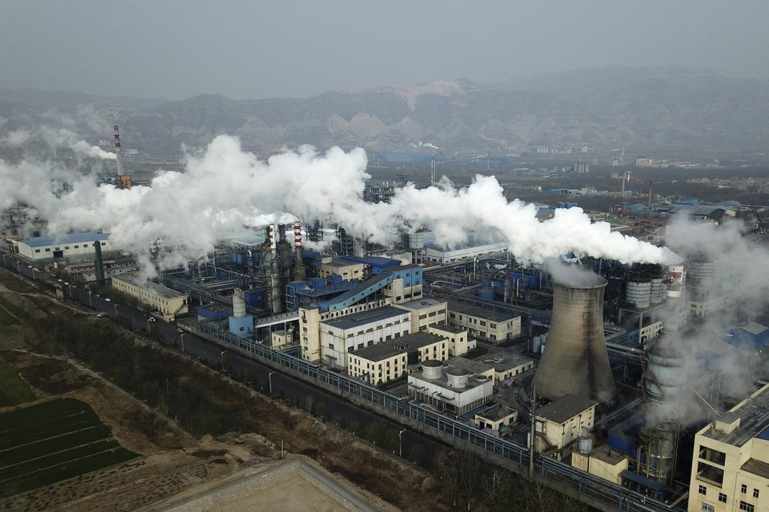 In this file photo from November 28, 2019, smoke and steam rise from a coal processing plant in Hejin in central China's Shanxi Province. Photo: AP
