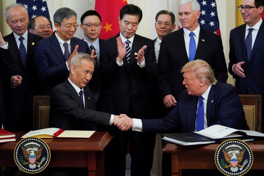 Chinese Vice-Premier Liu He and US President Donald Trump signed the phase one trade deal in January. Photo: Reuters
