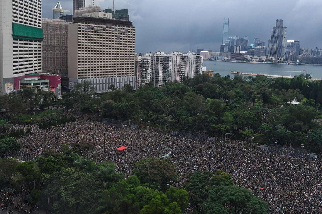 Protesters gather for a peaceful rally in Victoria Park on August 18, 2019. Photo: AFP