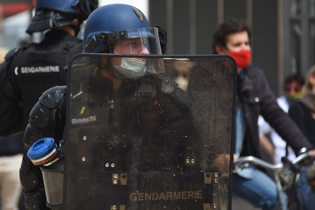 A French Police officer wearing a face mask. Photo: AFP