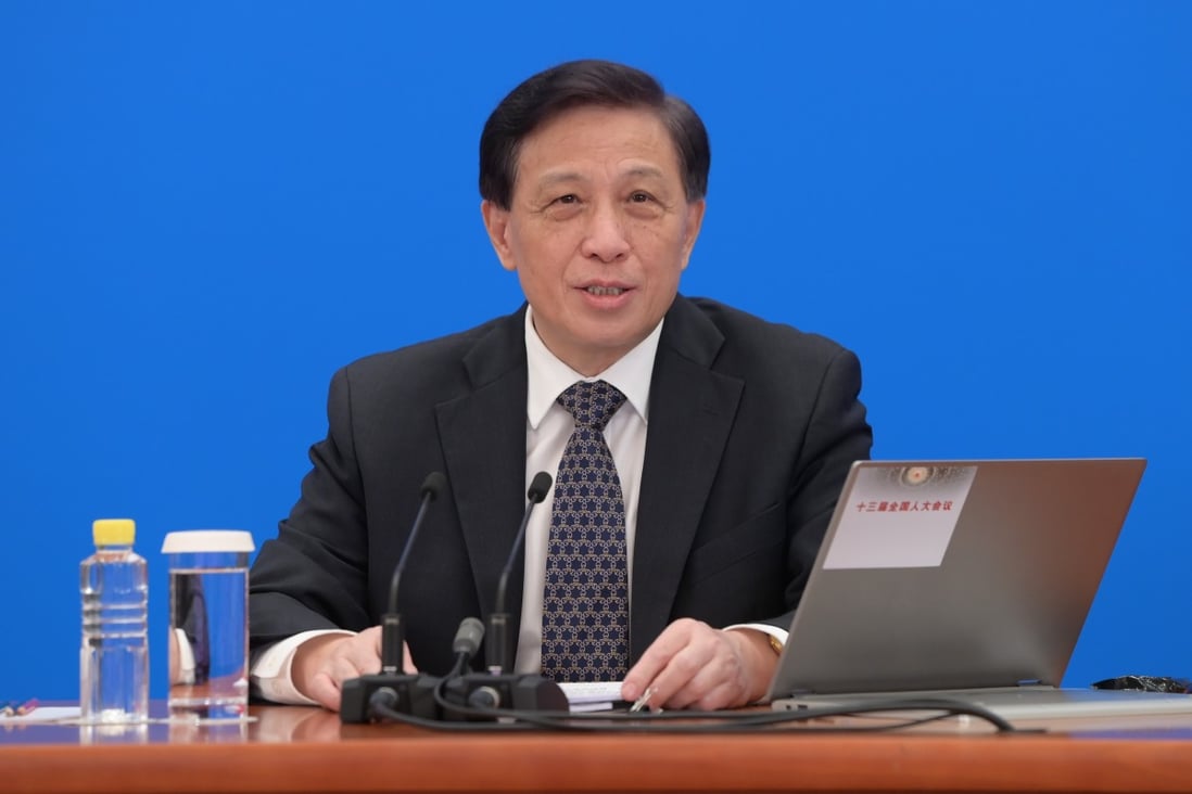 Zhang Yesui took questions from reporters on the agenda of the National People’s Congress via video link. Photo: Xinhua