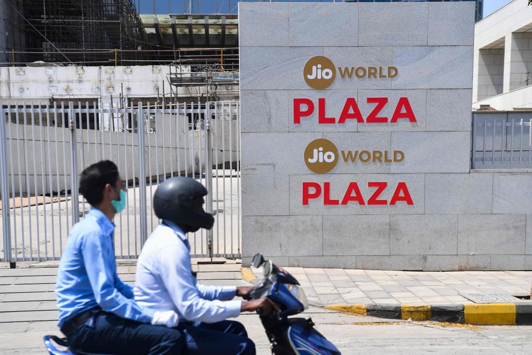Motorists ride past the Jio World Centre during a government-imposed nationwide lockdown as a preventive measure against the spread of the Covid-19 coronavirus, in Navi Mumbai on April 22, 2020. Photo: AFP