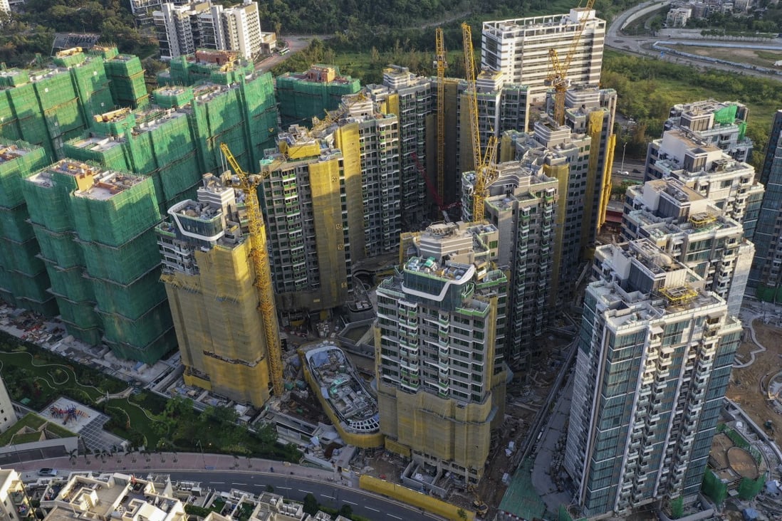K Wah International’s Solaria project, in the yellow cladding in the middle, in Hong Kong’s Tai Po district. Photo: Martin Chan