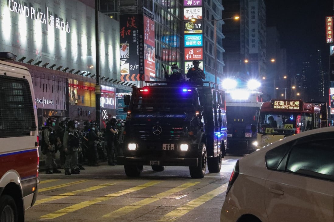Police deploy a water cannon and armoured personnel carrier in Mong Kok. Photo: Dickson Lee