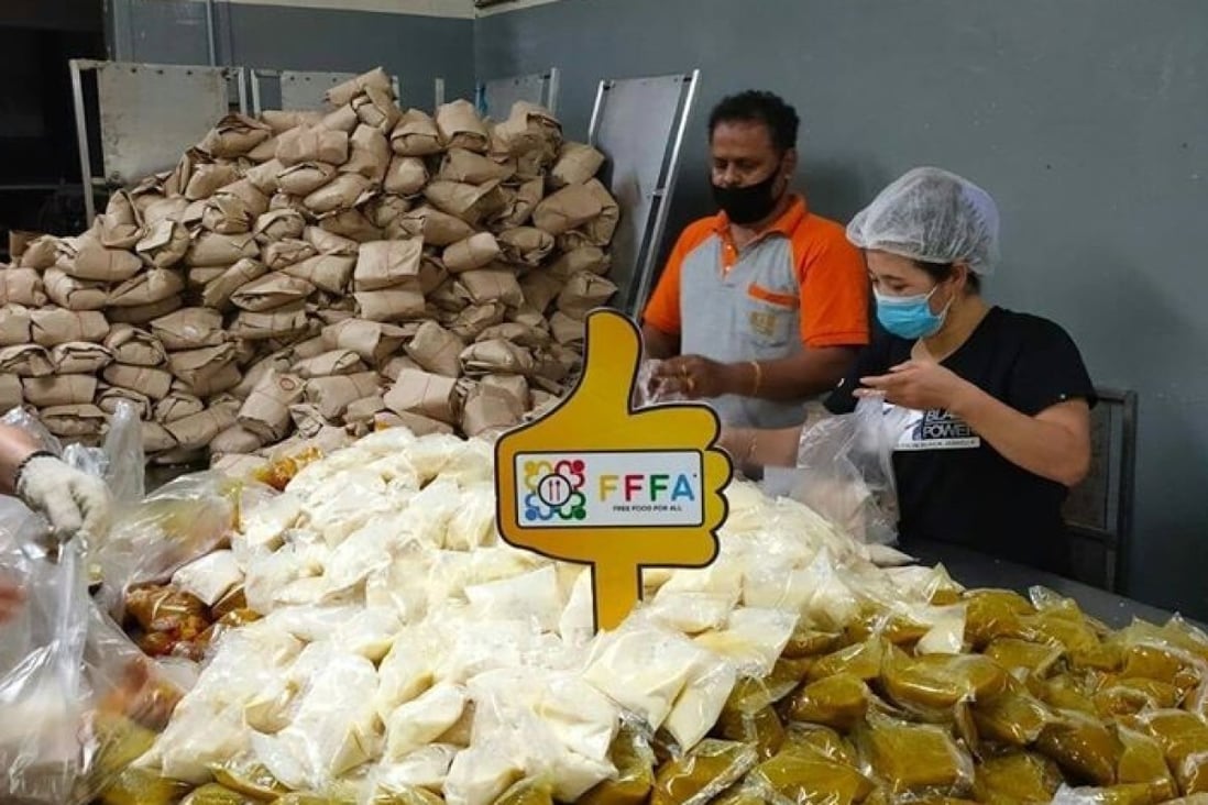Volunteers at Free Food For All in Singapore prepare meals for low-income households. Photo: Facebook / Free Food For All
