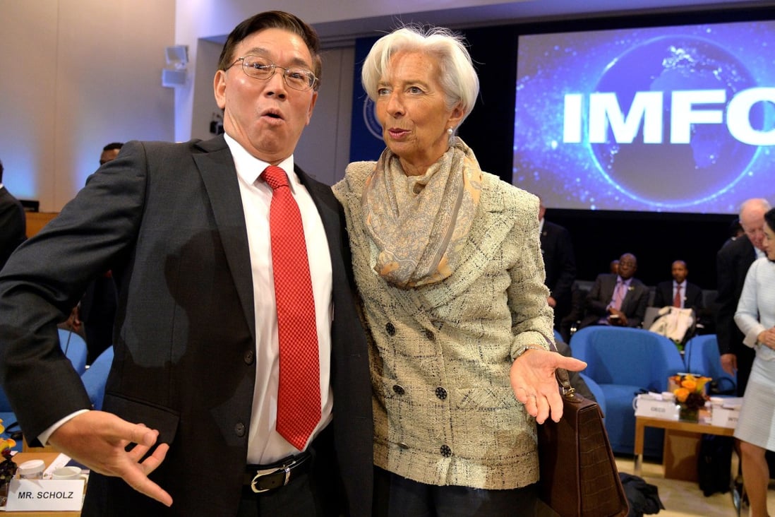 International Monetary Fund China staff member Lin Jianhai and European Central Bank president Christine Lagarde attend the IMF Finance Committee Plenary on October 19 last year. Photo: Reuters