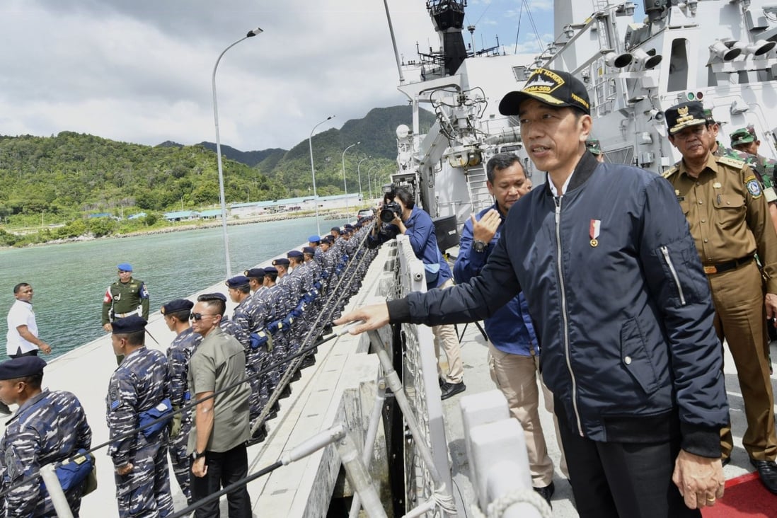 Indonesian President Joko Widodo, second right, pictured in January on the deck of an Indonesian Navy ship in the Natuna Islands, which overlap with Beijing’s expansive South China Sea claims. Photo: A