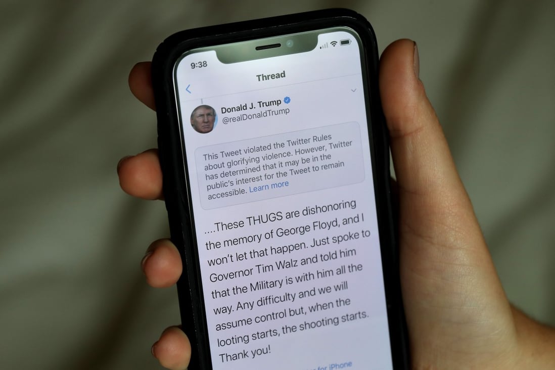 In this photo illustration a notification from Twitter appears on a tweet by US President Donald Trump that the social media platform says violated its policy on May 29, 2020 in San Anselmo, California. Photo: AFP