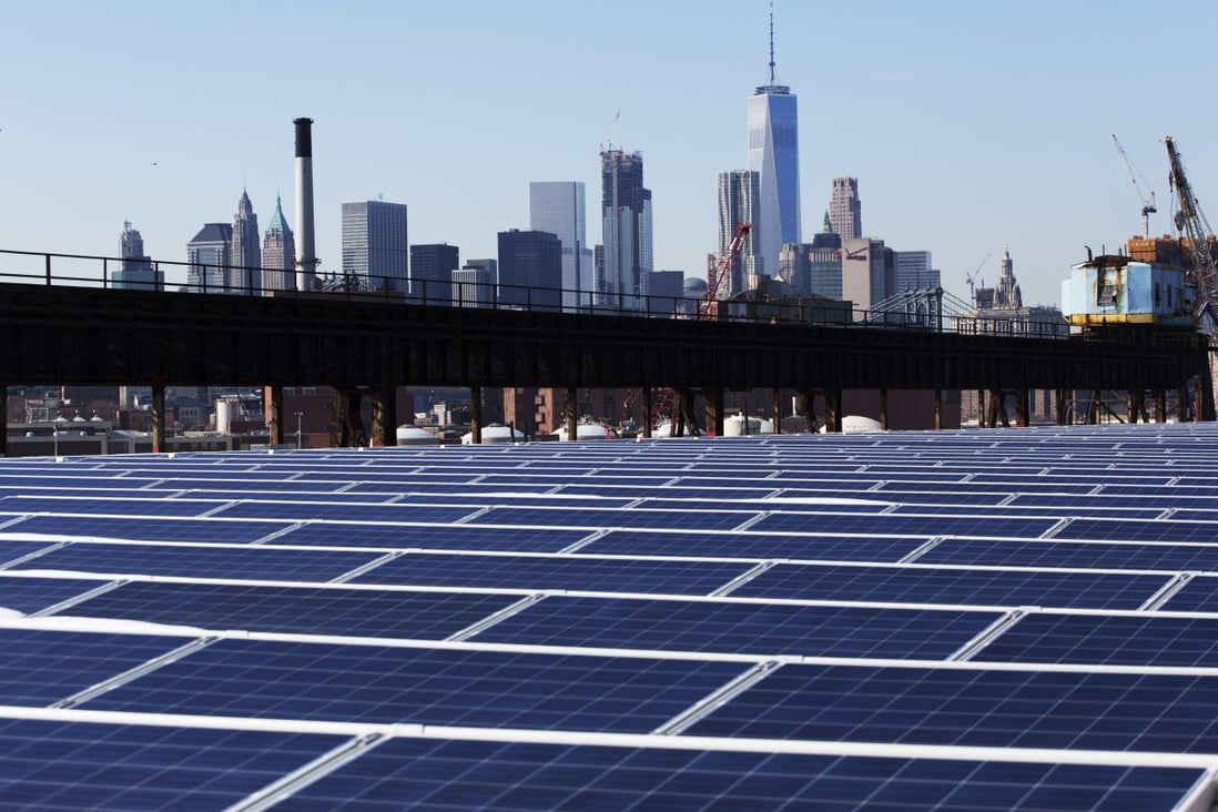 A rooftop is covered with solar panels at the Brooklyn Navy Yard in New York in this 2017 file photo. Cheap solar panels, mostly imported from China, led to a boom in the US solar industry during the past decade. Photo: AP