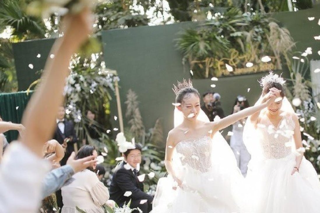 Shui Yue (left) and her partner Pu Yurong pictured at their wedding ceremony in January. Photo: Handout