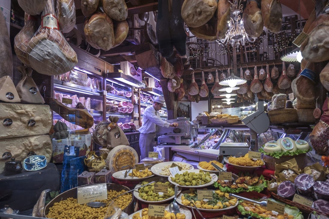 Italy is famous for its food and has amazing regional cuisines. A typical grocery shop in Bologna, Emilia-Romagna. Photo: Shutterstock