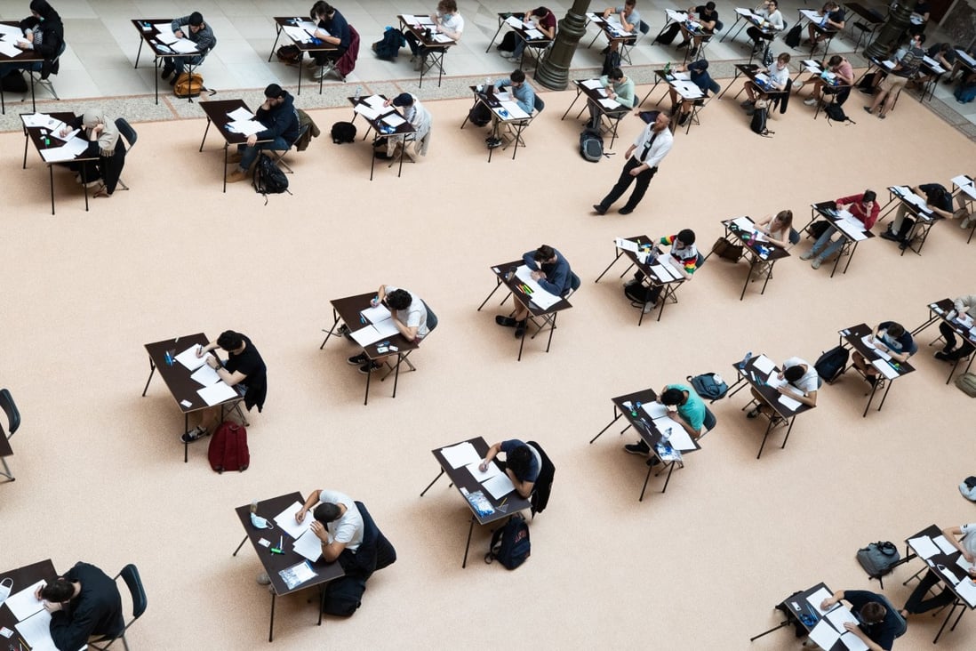 Students take their exams while socially distancing at a university in Belgium on Tuesday. Photo: DPA