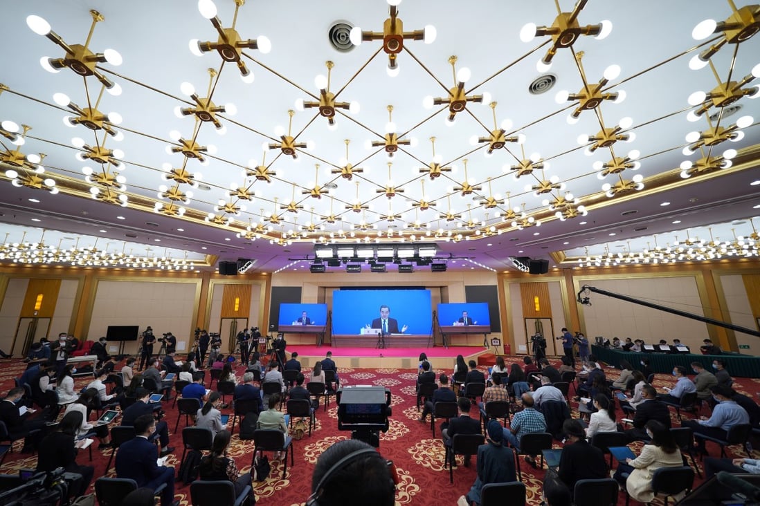 Simultaneous translation, in languages including English and French, is offered for a press conference given by Chinese Foreign Minister Wang Yi via video link in Beijing on May 24. Photo: Xinhua