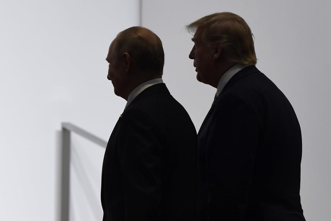 Donald Trump and Vladimir Putin pictured at a G20 summit in Japan. The US President has repeatedly pushed for Russia to be readmitted to the G7. Photo: AP
