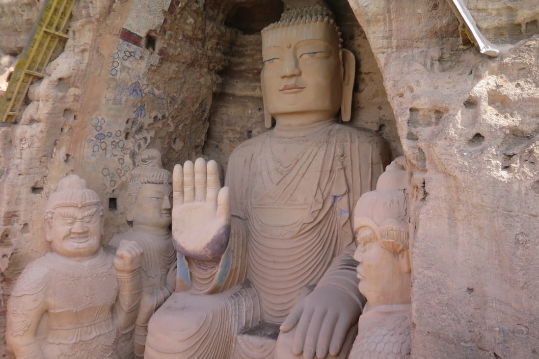 The 15-metre-high Buddha at the Tiantishan Grottoes. Photo: Megan Eaves