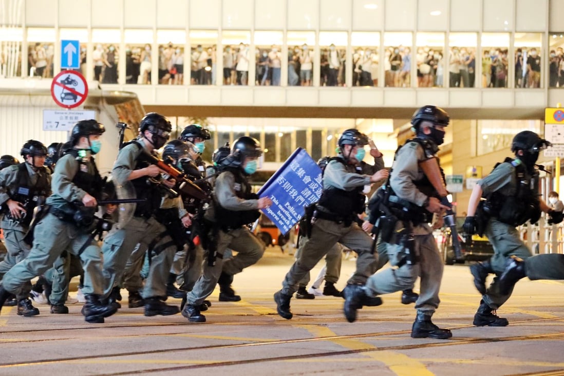 Hong Kong protests: police fire pepper spray as hundreds gather in ...