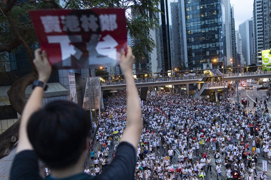 Demonstrators marched in their hundreds of thousands against the extradition bill on June 9, 2019. Photo: Bloomberg