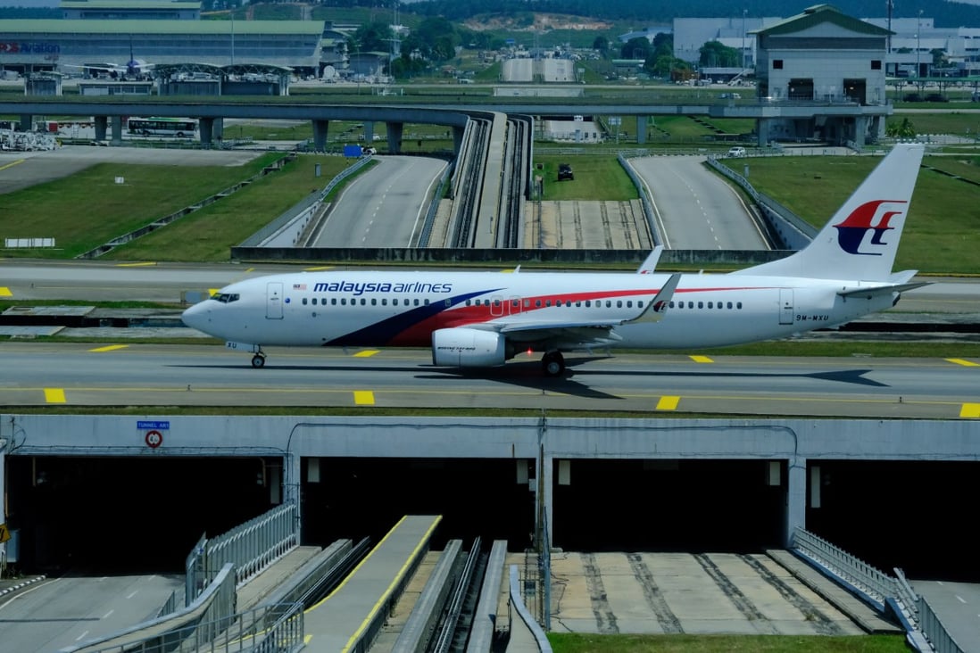 A Boeing 737 aircraft, operated by Malaysian Airlines, at the Kuala Lumpur International Airport (KLIA) in Sepang, Selangor, Malaysia, on Tuesday, March 17, 2020. Photo: Bloomberg