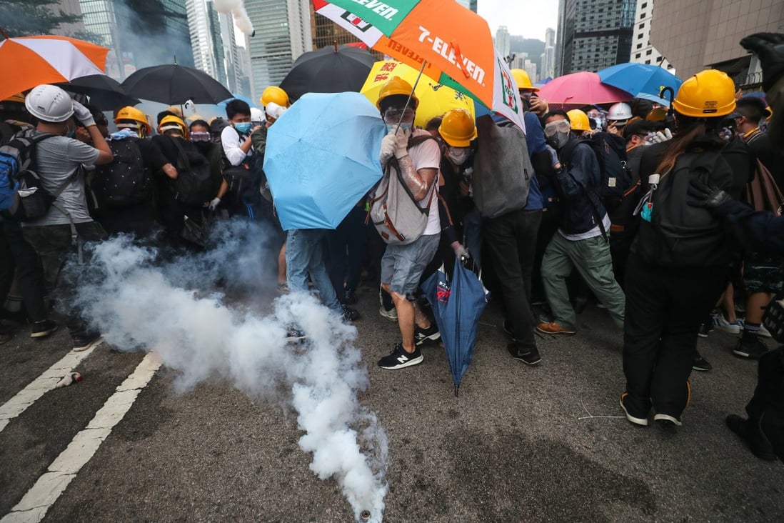 Tear gas is used to disperse protesters in Admiralty on June 12 last year. Photo: Sam Tsang