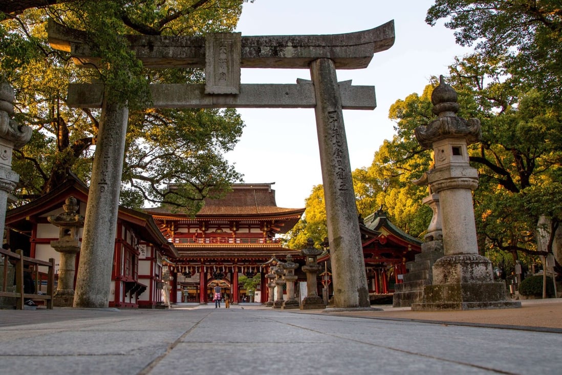 Torii and sacred pathway leading to the main gate of a shrine in Fukuoka, Japan. A virtual tour of Kashii in Fukuoka includes a visit to one of the oldest Shinto shrines in Japan, built 1,800 years ago. Photo: Zhang Peng/LightRocket via Getty Images