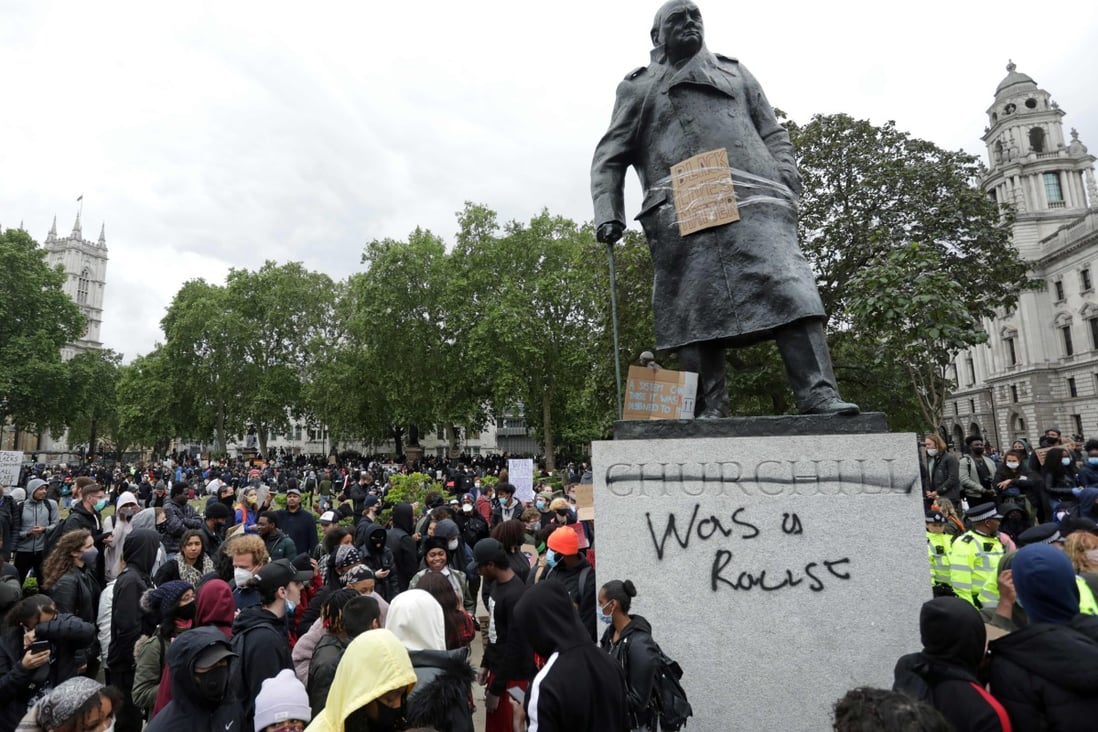A statue of Winston Churchill outside parliament was defaced during a ‘Black Lives Matter’ rally in central London. Photo: AFP