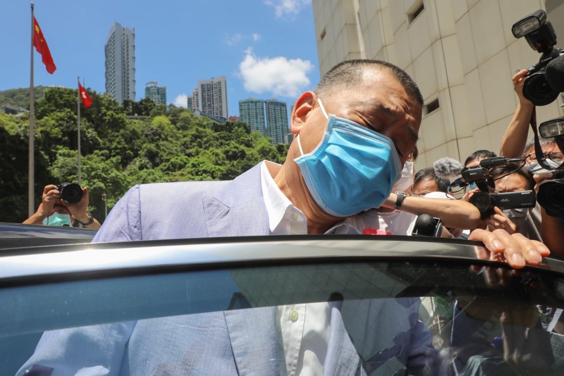 Apple Daily founder Jimmy Lai leaves the High Court in Admiralty after having his travel ban upheld. Photo: Sam Tsang