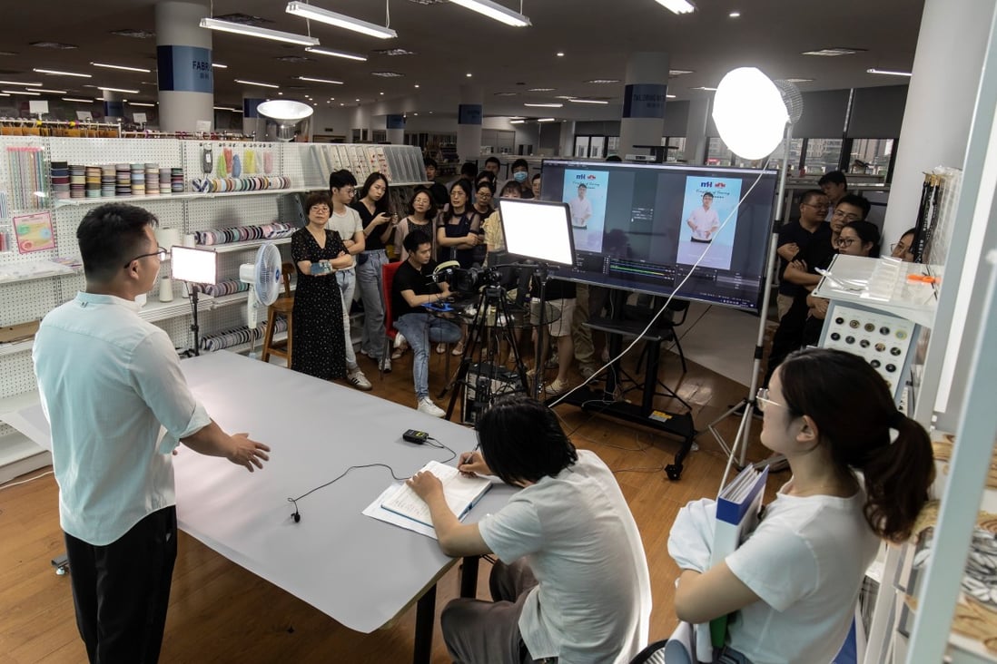 Employees rehearse hosting a livestream session for the upcoming Canton Fair inside a showroom at Ningbo MH Industry. Photo: Bloomberg