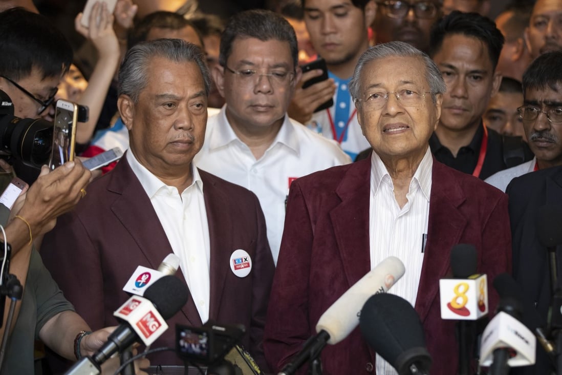 Mahathir Mohamad (right) in 2018, beside Muhyiddin Yassin, who replaced him as prime minister earlier this year. Photo: AP