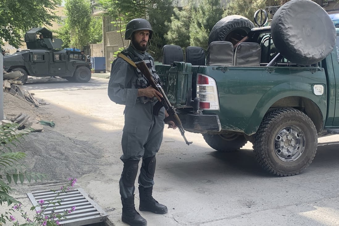 Afghan police arrive at the site of an explosion in a mosque in Kabul on Friday, causing multiple deaths and injuries, as the Taliban ramps up violence in the country. Photo: AP