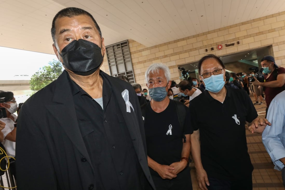 Media tycoon Jimmy Lai (left), at West Kowloon Court, is one of the 15 defendants. Photo: Dickson Lee