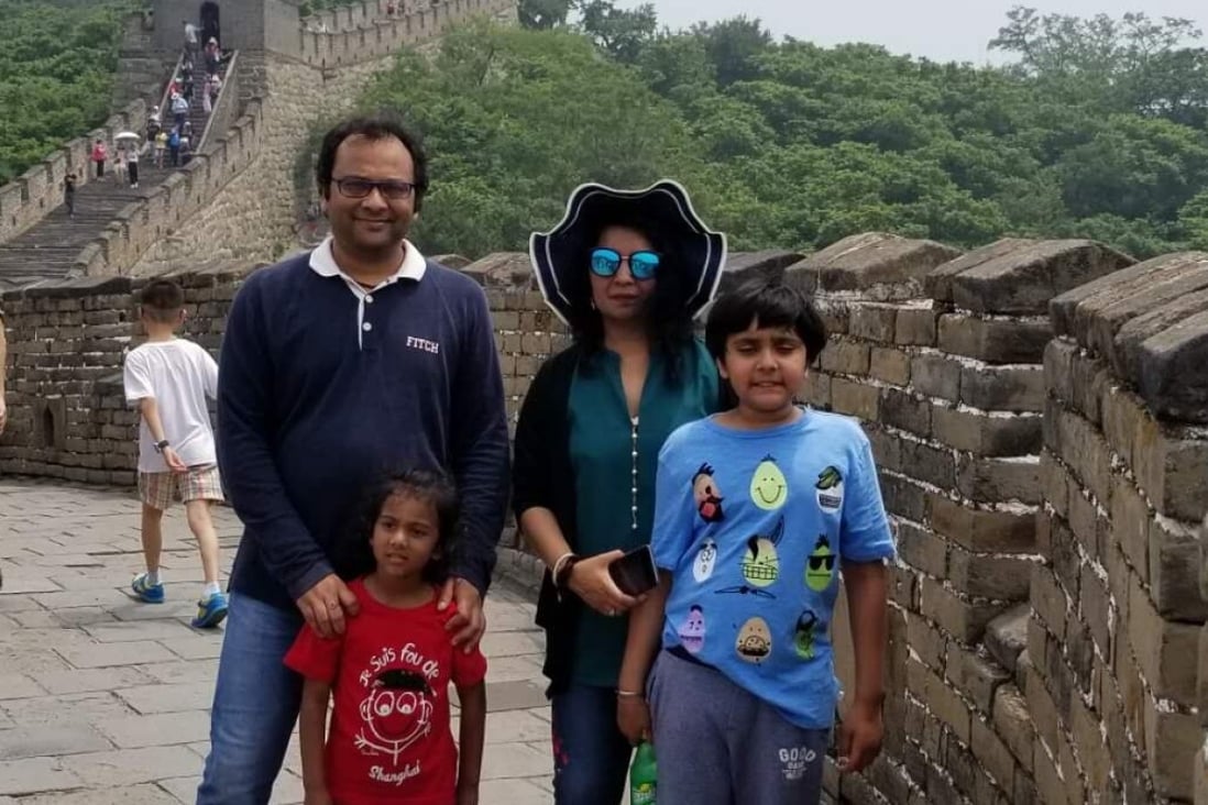 Indian national Vivek Gupta and his family at the Great Wall of China. Photo: Handout / Rajni George