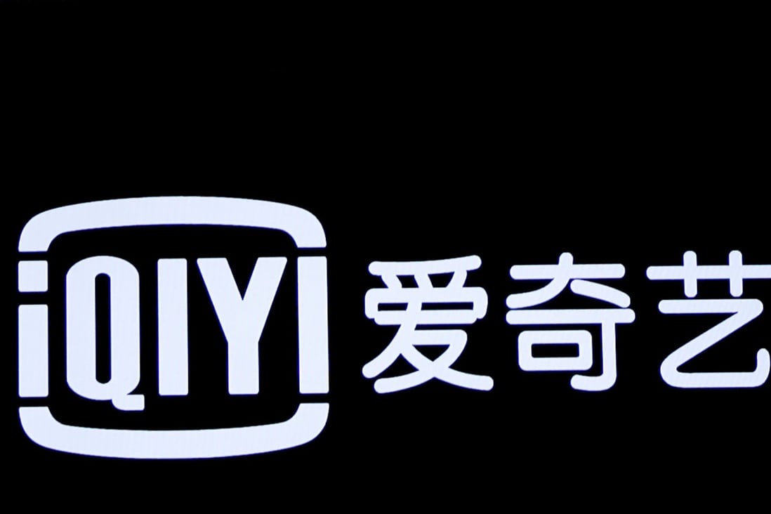 The logo for Chinese streaming platform iQiyi is displayed on a screen during the company's IPO at the Nasdaq Market Site in New York City in 2018. Photo: Reuters