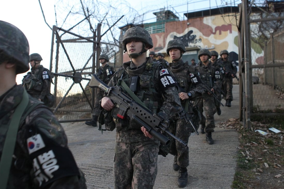 South Korean soldiers leaving a guard post near the Demilitarised Zone. Photo: EPA