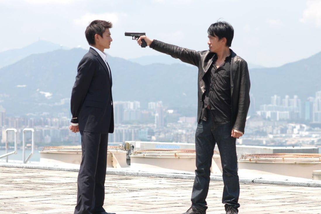Andy Lau Tak-wah (left) and Tony Leung Chiu-wai in a still from Infernal Affairs. Both it and its American remake The Departed tell the story of two moles: an undercover officer and a gang member who works for the police.