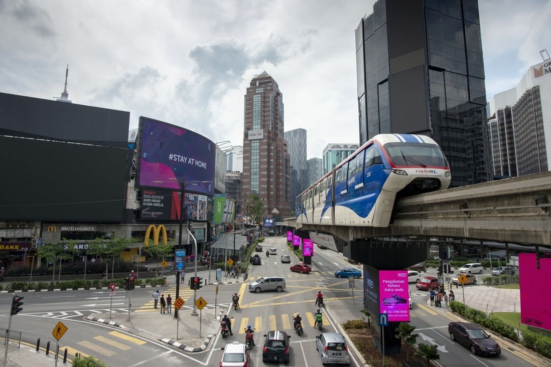 An intersection in Kuala Lumpur, as Malaysia eases its coronavirus restrictions to allow economic activity to resume. Economists say stimulus packages should be administered carefully and only spent in necessary areas. Photo: Xinhua