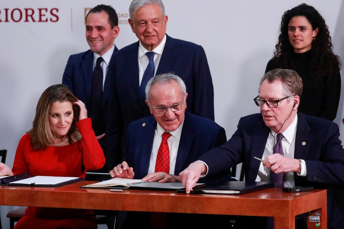 Jesus Seade (front, centre) helped negotiate the United States-Mexico-Canada Agreement (USMCA) with US Trade Representative Robert Lighthizer (front, right). Photo: Reuters