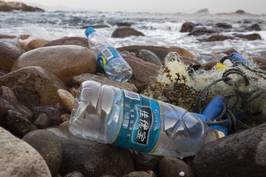 Discarded plastic water bottles are washed up on a beach in Lung Ha Wan in December 2018. Photo: EPA-EFE