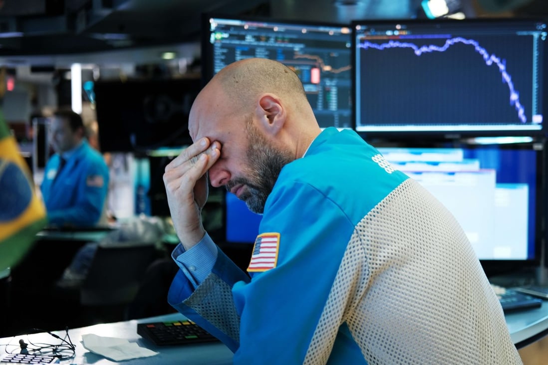 The Dow fell more than 1,200 points on March 18 as the coronavirus pandemic roils the world financial markets. Photo: AFP